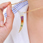 Brosche mit Regenbogenkurven-Diamantanhänger aus 18-karätigem Gold mit Kanalfassung