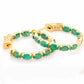 Handcrafted gold hoops with genuine emerald gemstones