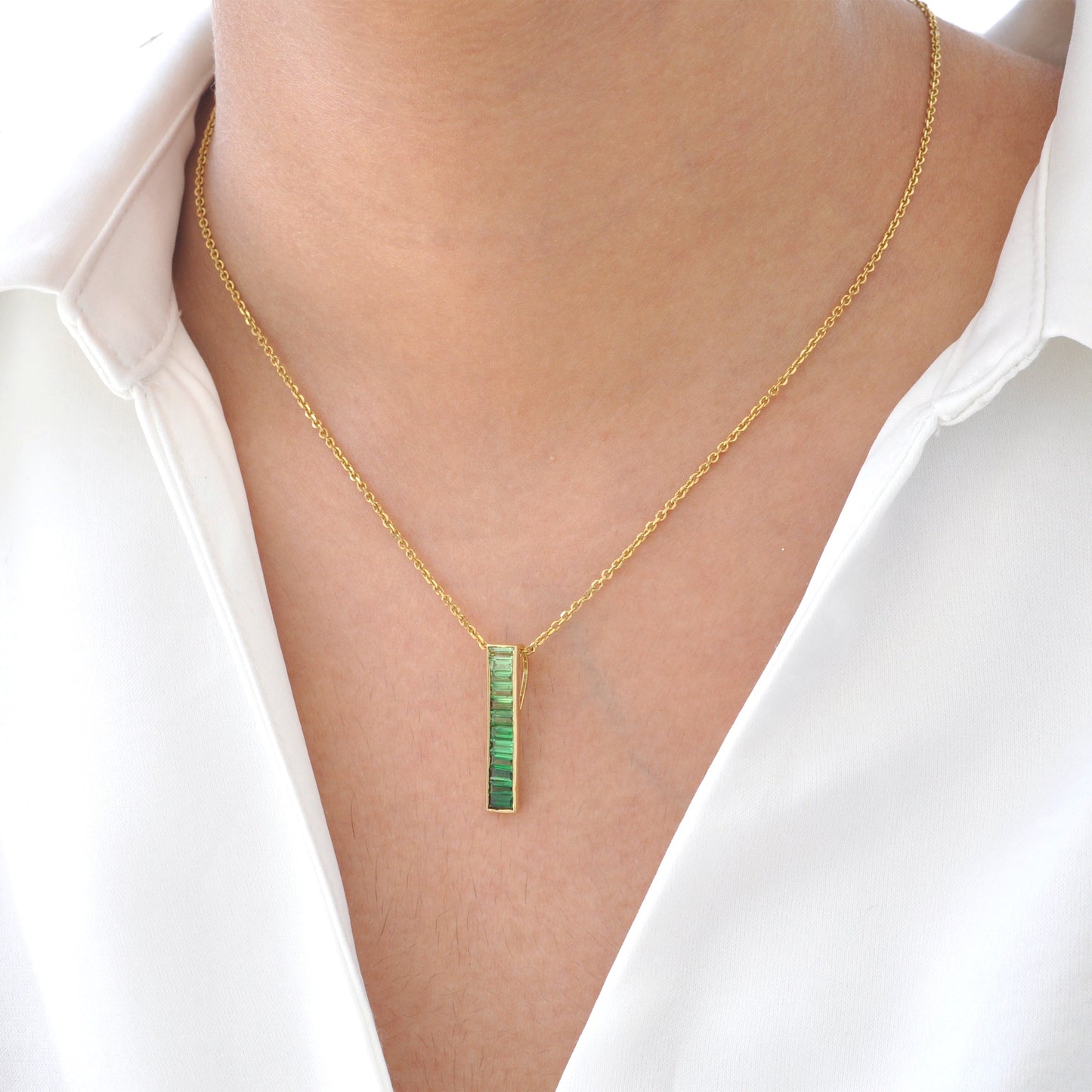 Pendentif barre baguette en tsavorite en or 18 carats