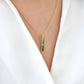 Pendentif barre baguette en tsavorite en or 18 carats