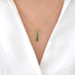 Pendentif barre baguette en tsavorite en or 18 carats