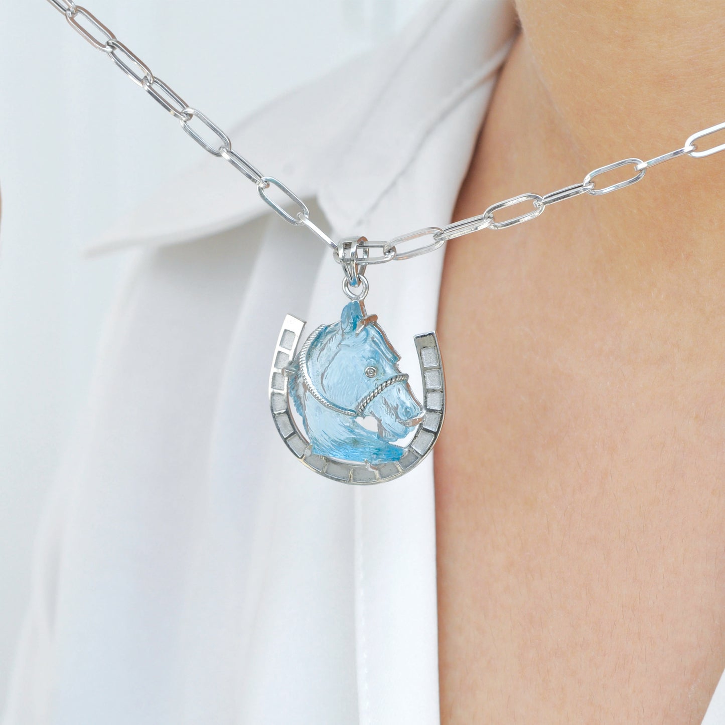 Hand-Carved Swiss Blue Topaz Horse Shoe Pendant
