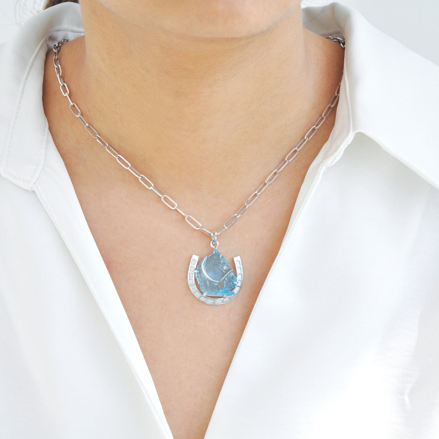 Hand-Carved Swiss Blue Topaz Horse Shoe Pendant