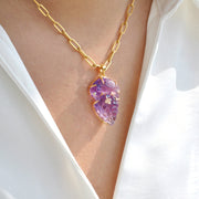 Hand-Carved Amethyst Parrot Pendant