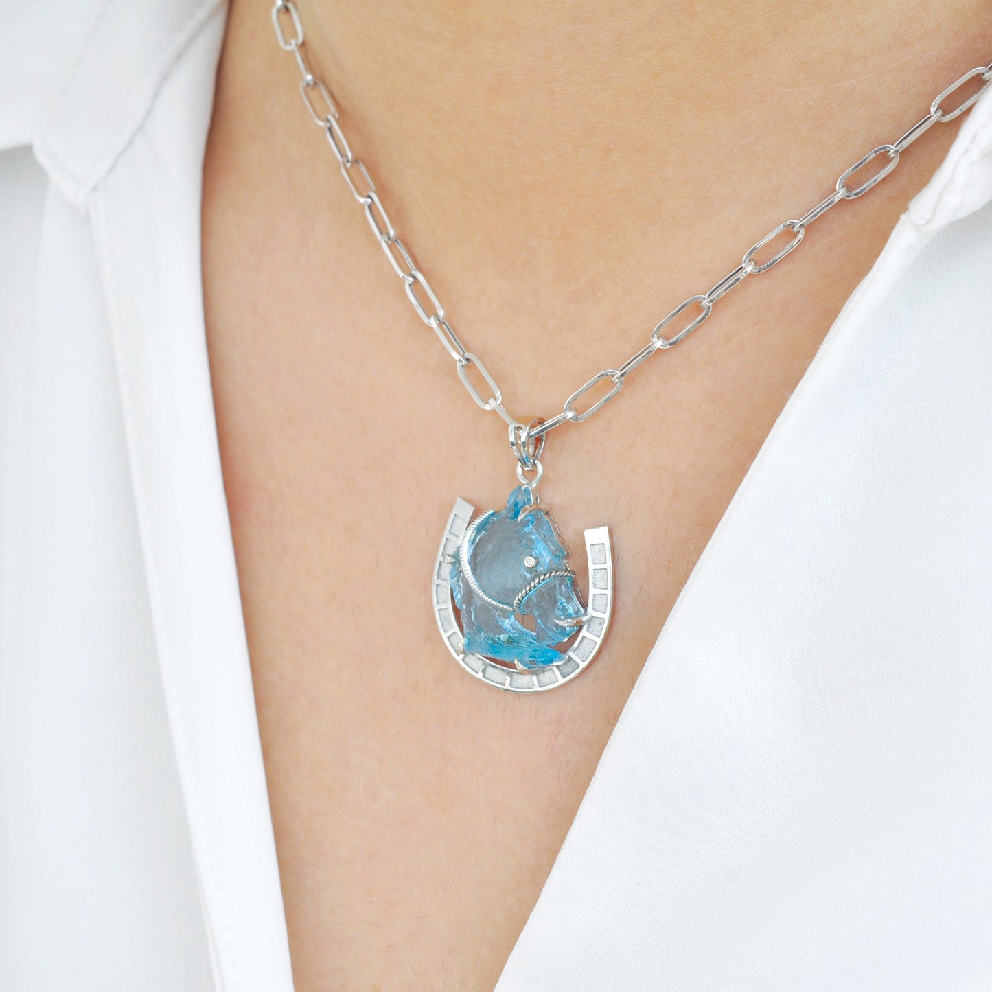 Hand-Carved Swiss Blue Topaz Horse Shoe Pendant