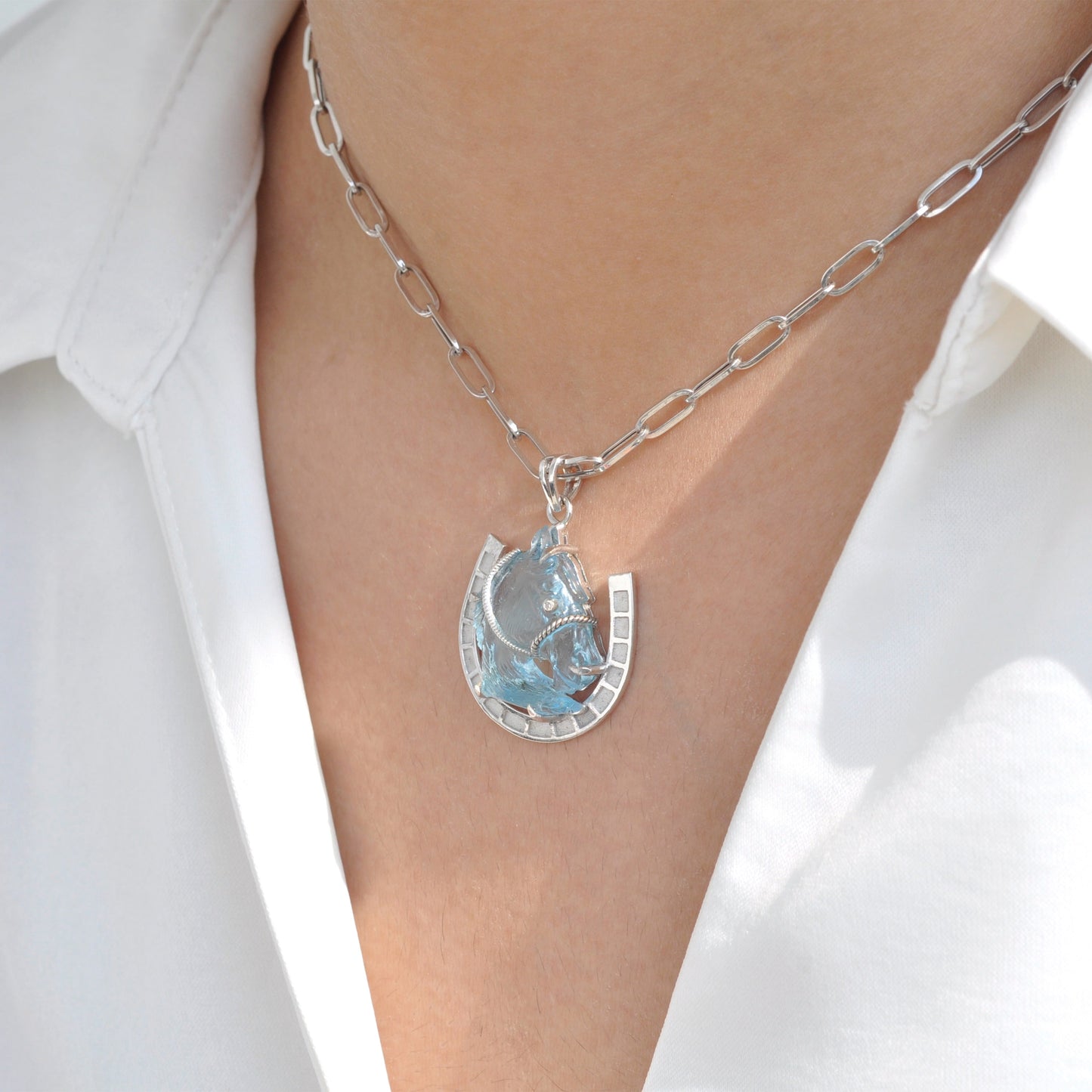Hand-Carved Swiss Blue Topaz Horse Shoe Pendant