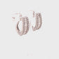 Boucles d'oreilles créoles Huggie baguette en or blanc 18 carats et diamants