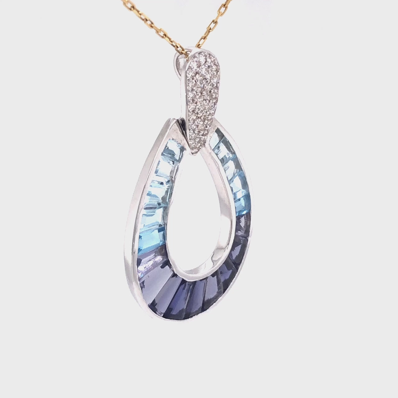 Iolite pendant with diamond silver