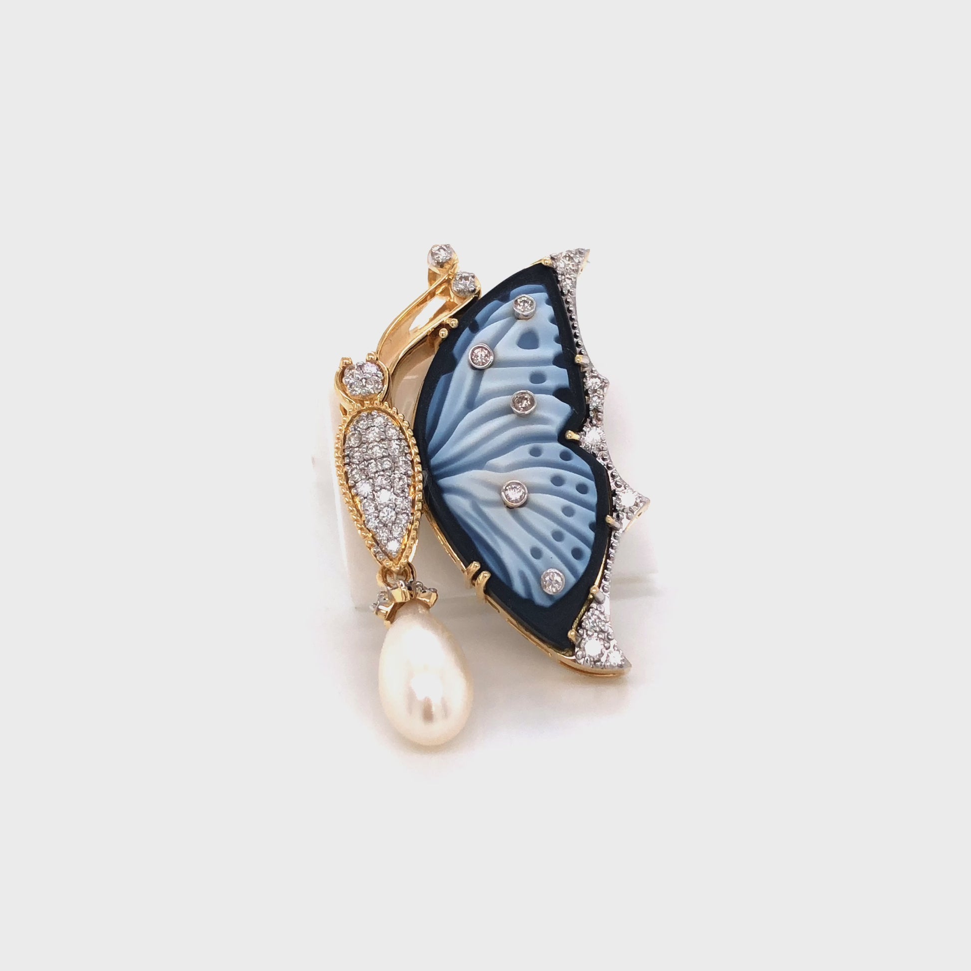 Delicate butterfly brooch with pearl