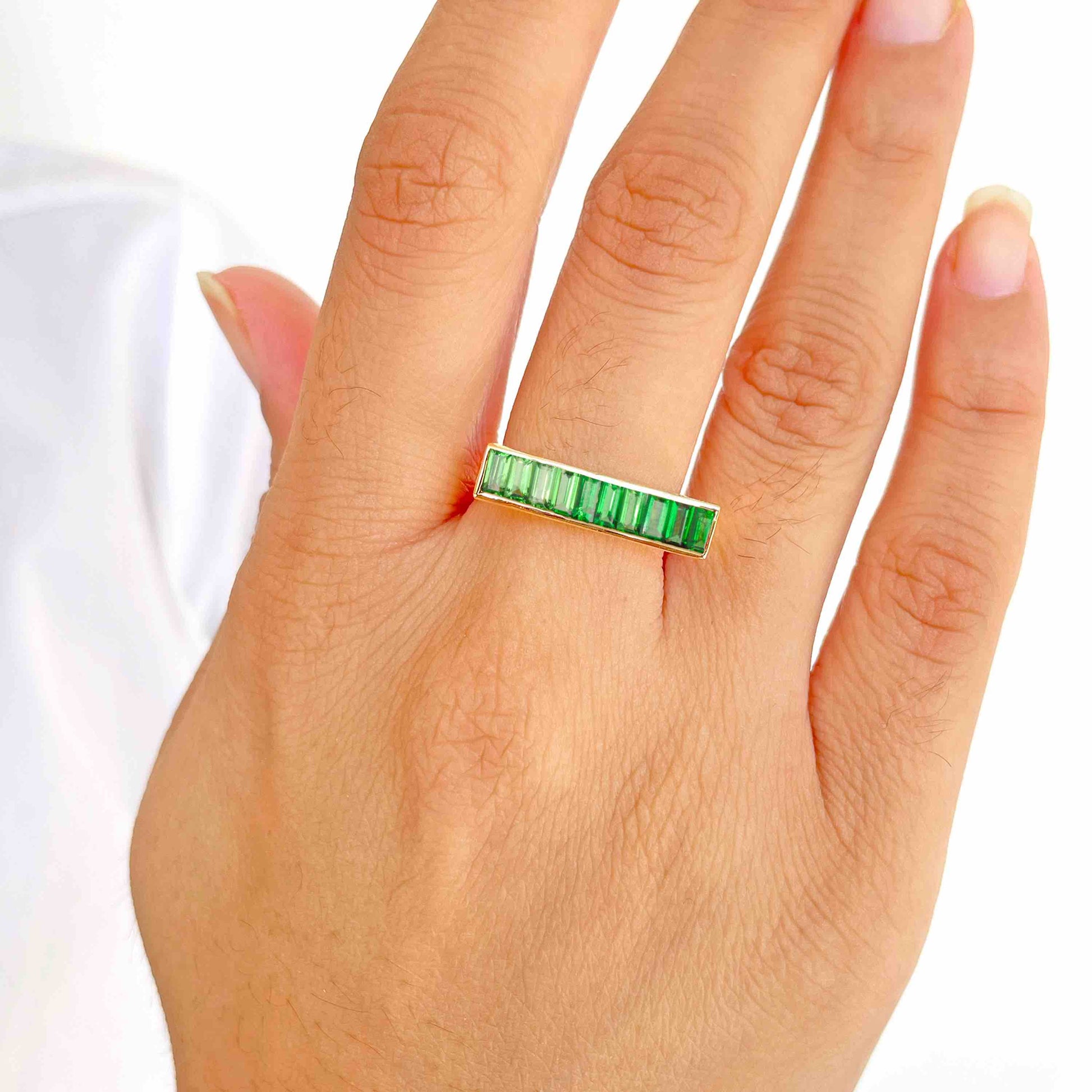 green gemstone ring designs